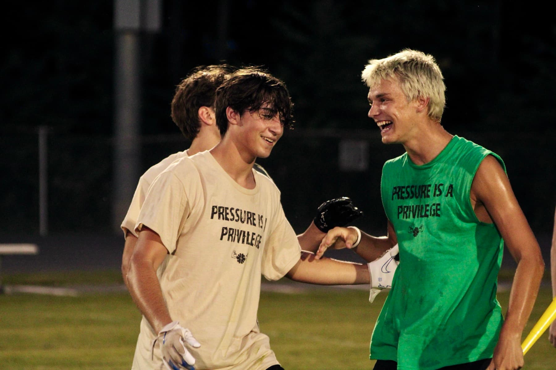 Two athletes celebrating after a drill