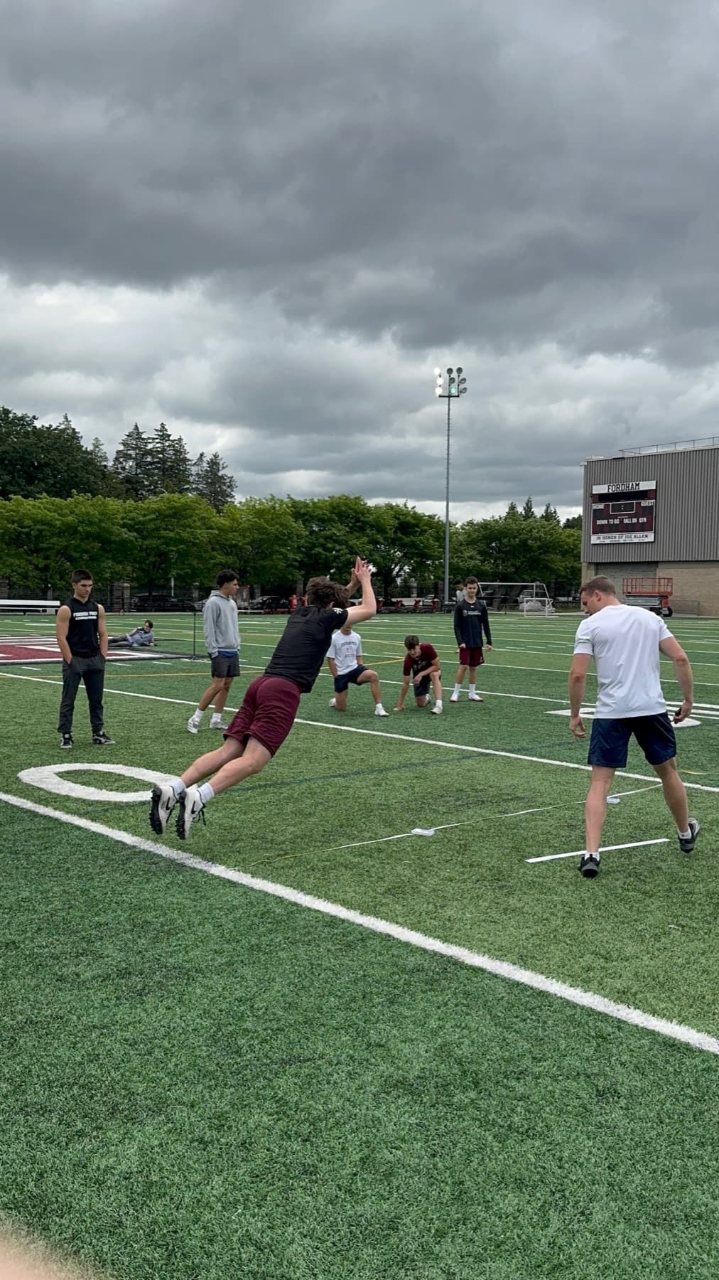 An athlete sprinting on the turf